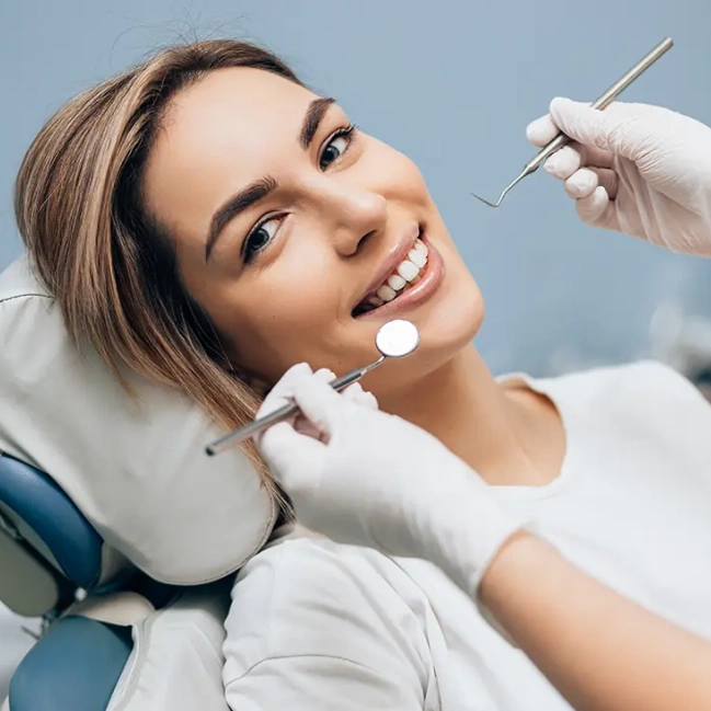 Patient receiving professional dental care with a bright healthy smile