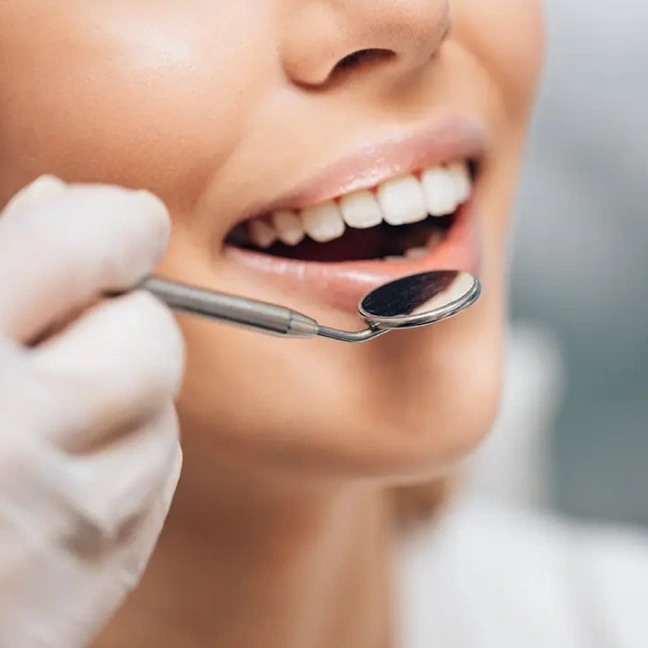 Cosmetic tooth reshaping to improve smile appearance