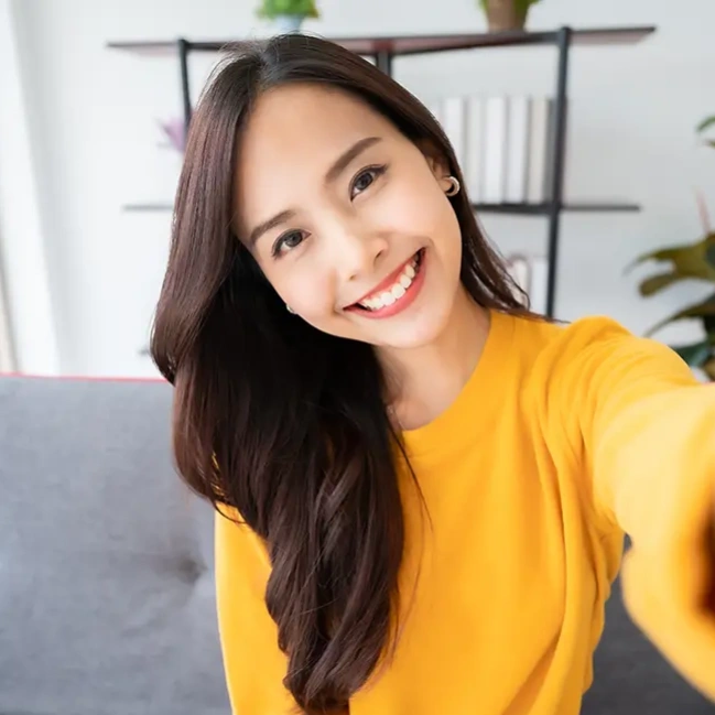 Happy patient after comprehensive dental treatment